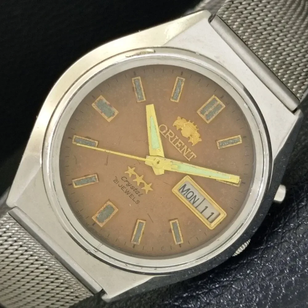 Vintage 1974 Orient Automatic Mens Silver Watch W/daydate & Gold accents